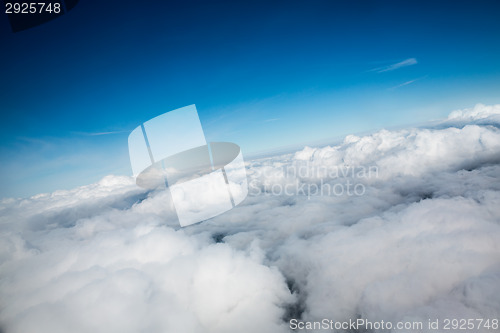 Image of bird's-eye view blue sky with clouds