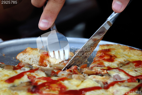 Image of Eating pizza