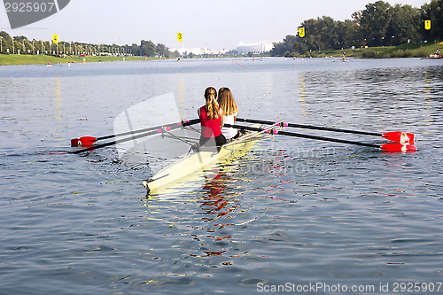 Image of Two girls in a boat