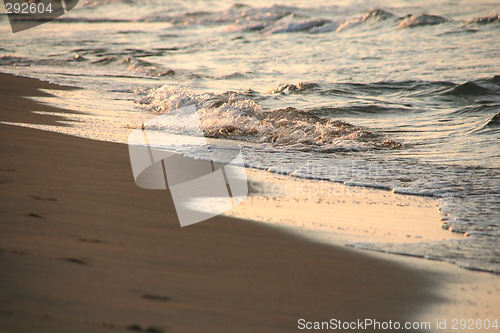 Image of sunrise sea waves