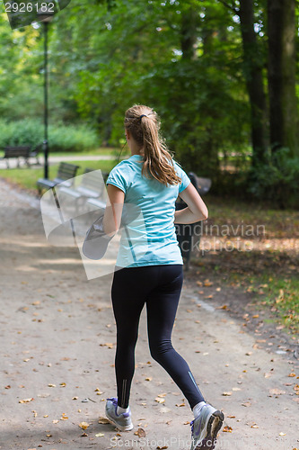 Image of Young female jogger