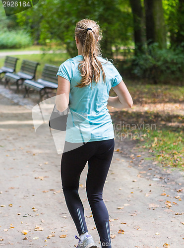 Image of Young female jogger
