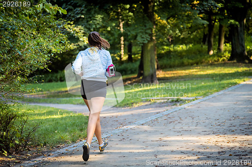 Image of Young female jogger