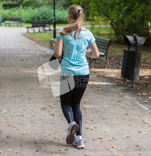 Image of Young female jogger