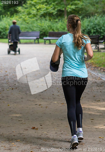 Image of Young female jogger