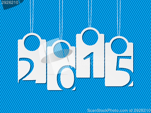 Image of Hanging white labels showing year 2015