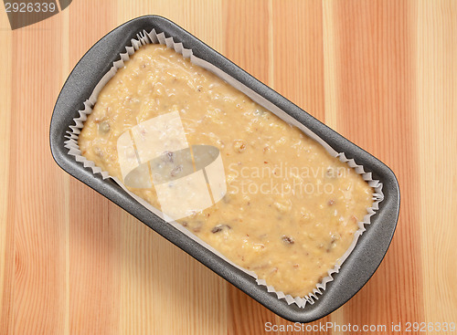 Image of Raw banana loaf batter in a lined tin 