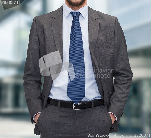 Image of close up of businessman standing outdoors