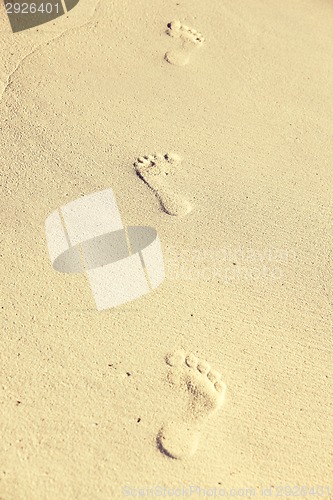 Image of footprints on sand