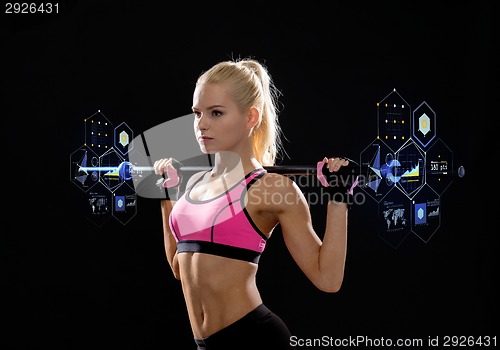 Image of sporty woman exercising with barbell