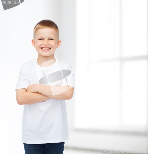 Image of smiling little boy in white blank t-shirt