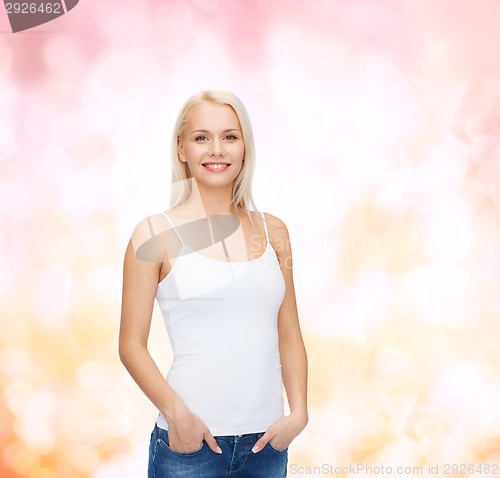 Image of smiling woman in blank white t-shirt