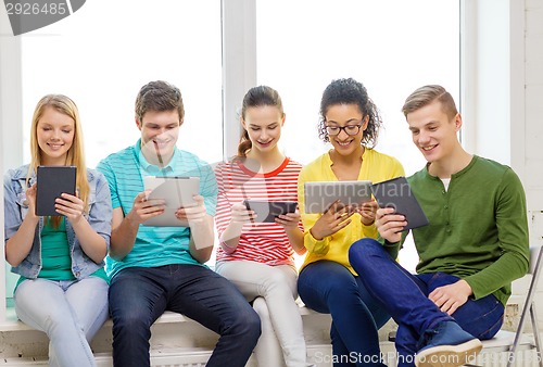 Image of smiling students with tablet pc computer