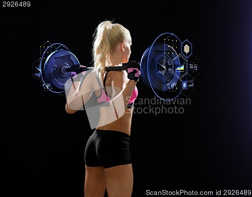 Image of sporty woman exercising with barbell from back