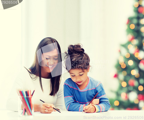 Image of mother and daughter drawing