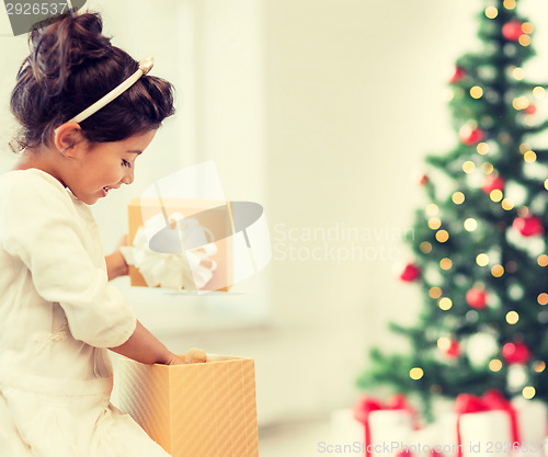 Image of happy child girl with gift box