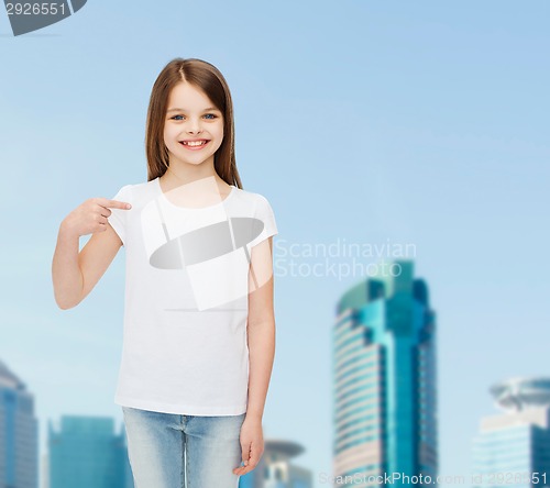 Image of smiling little girl in white blank t-shirt