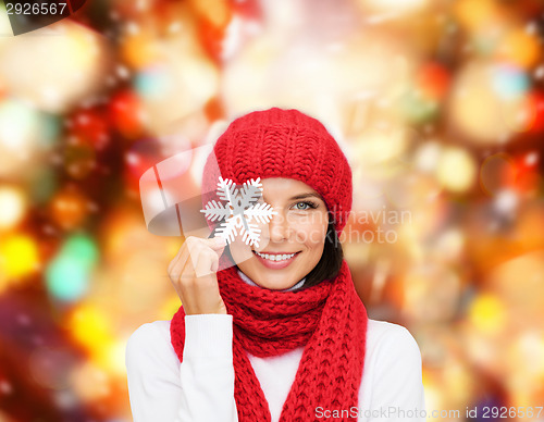 Image of smiling young woman in winter clothes