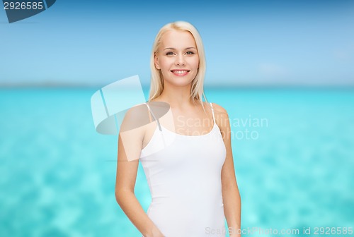 Image of smiling woman in blank white t-shirt