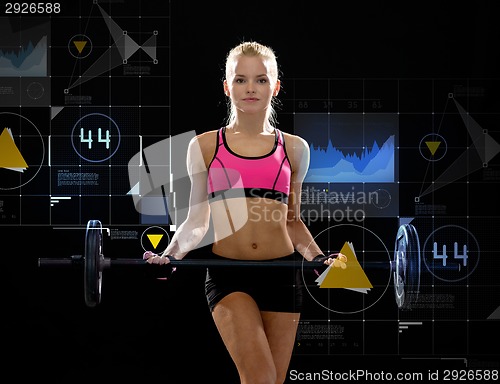 Image of sporty woman exercising with barbell