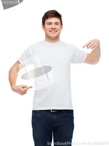 Image of smiling young man in blank white t-shirt