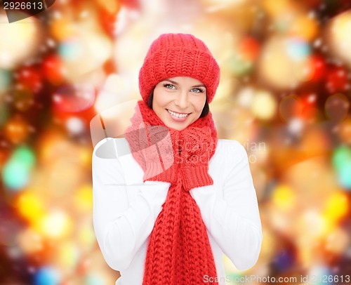 Image of smiling young woman in winter clothes