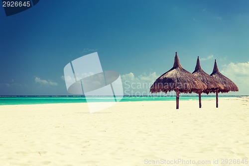 Image of tropical beach with palapa