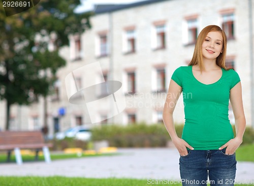 Image of smiling teenage girl in casual clothes
