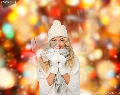 Image of smiling young woman in winter clothes