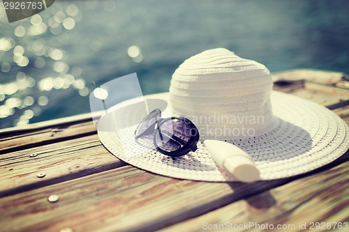 Image of close up of beach accessories at seaside