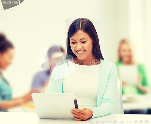 Image of businesswoman or student with tablet pc