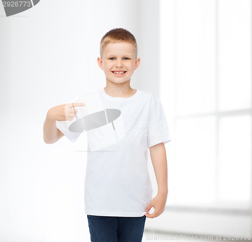 Image of smiling little boy in white blank t-shirt