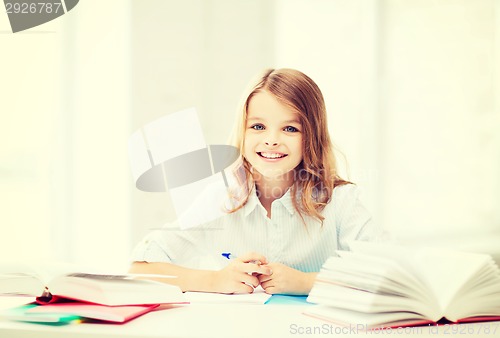 Image of student girl studying at school