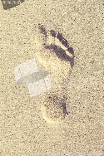 Image of footprint on sand