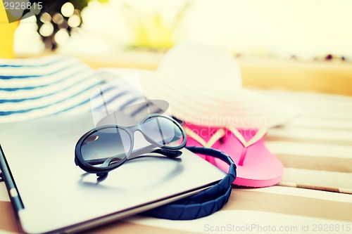 Image of close up of laptop on beach