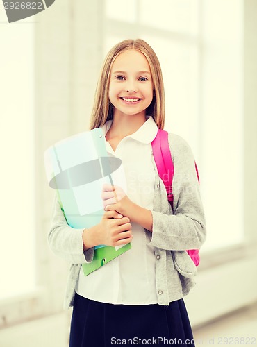 Image of happy and smiling teenage girl