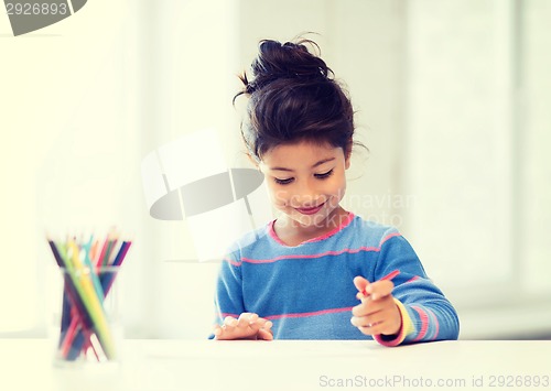 Image of little girl drawing