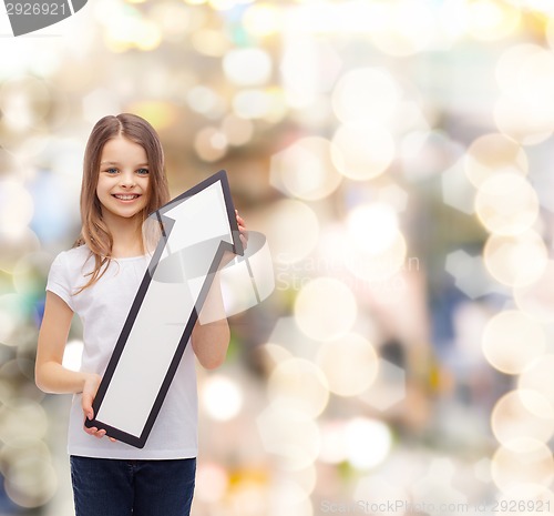 Image of smiling little girl with blank arrow pointing up