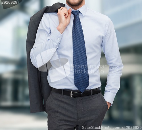 Image of close up of businessman standing outdoors