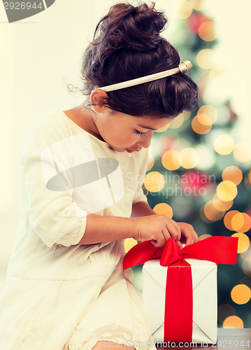 Image of happy child girl with gift box