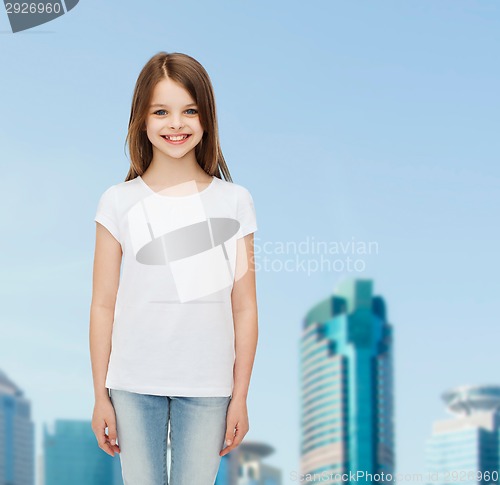 Image of smiling little girl in white blank t-shirt