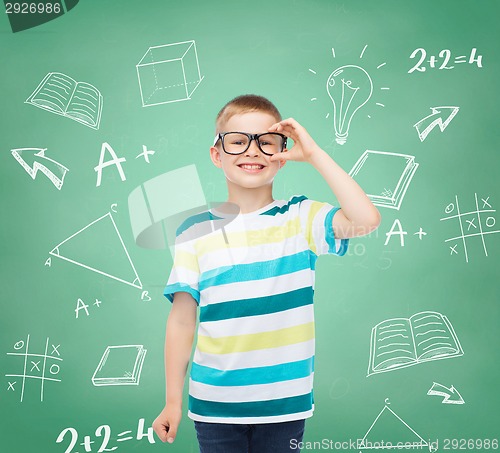 Image of smiling little boy in eyeglasses