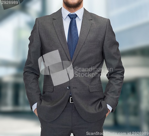 Image of close up of businessman standing outdoors