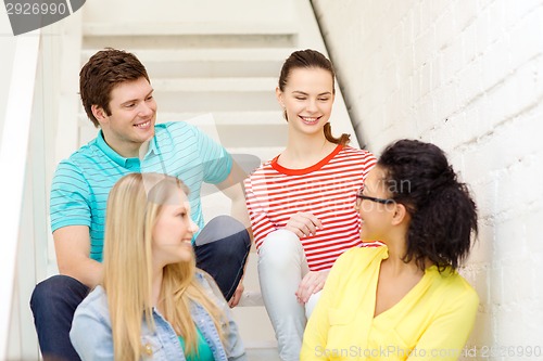 Image of smiling teenagers hanging out