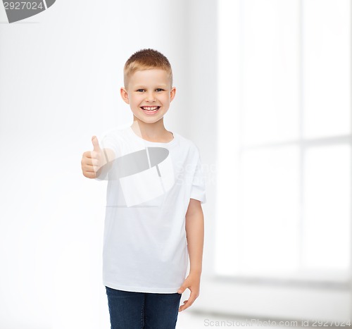 Image of smiling little boy in white blank t-shirt