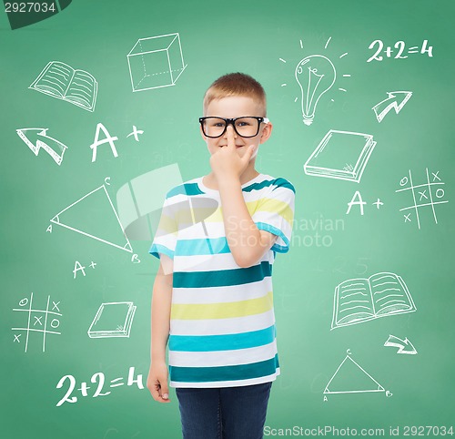 Image of smiling little boy in eyeglasses