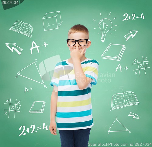 Image of smiling little boy in eyeglasses