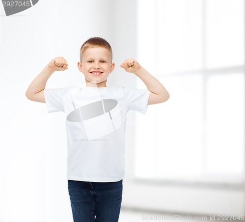 Image of smiling little boy in white blank t-shirt