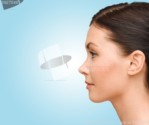Image of profile portrait of young woman