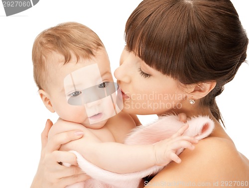 Image of happy mother kissing baby